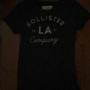 A blue hollister tee shirt